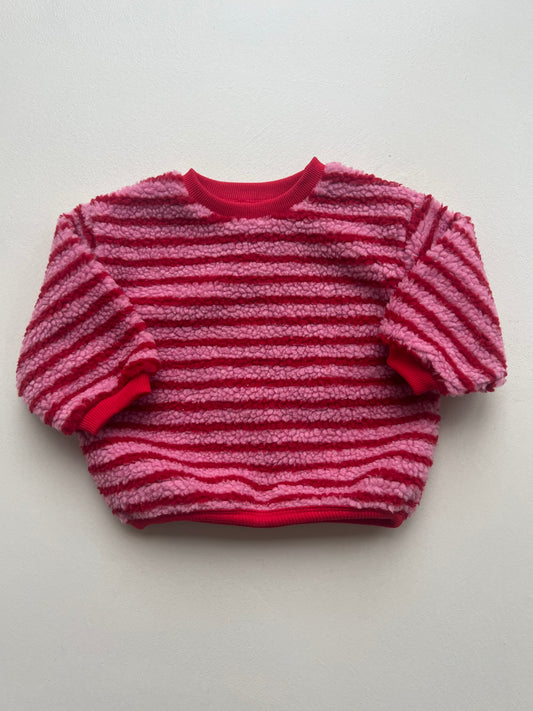 Pink striped sweatshirt