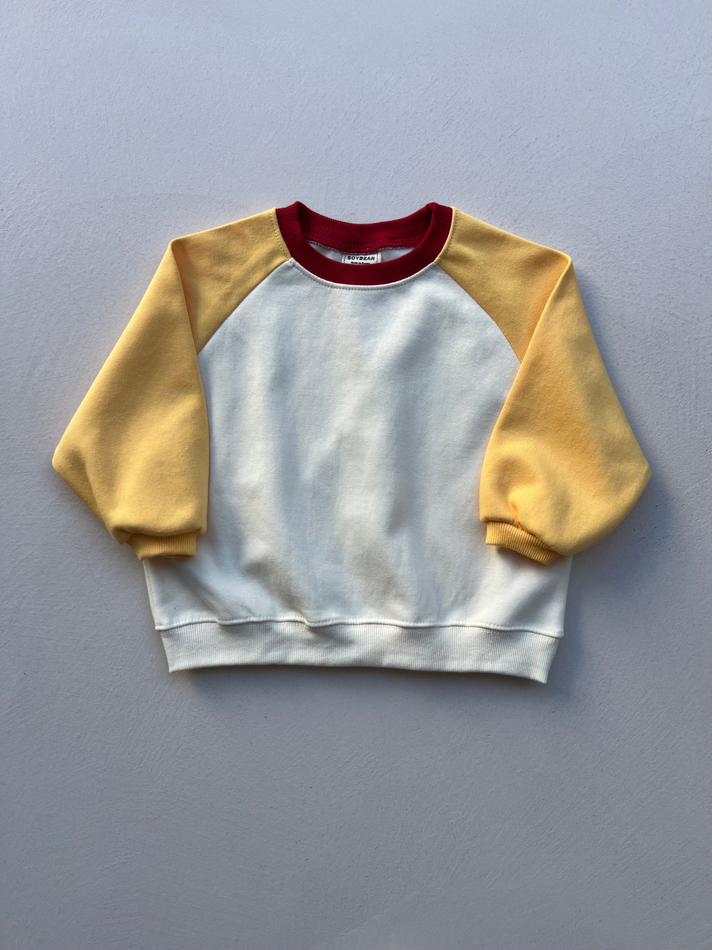 RAGLAN SWEATSHIRT