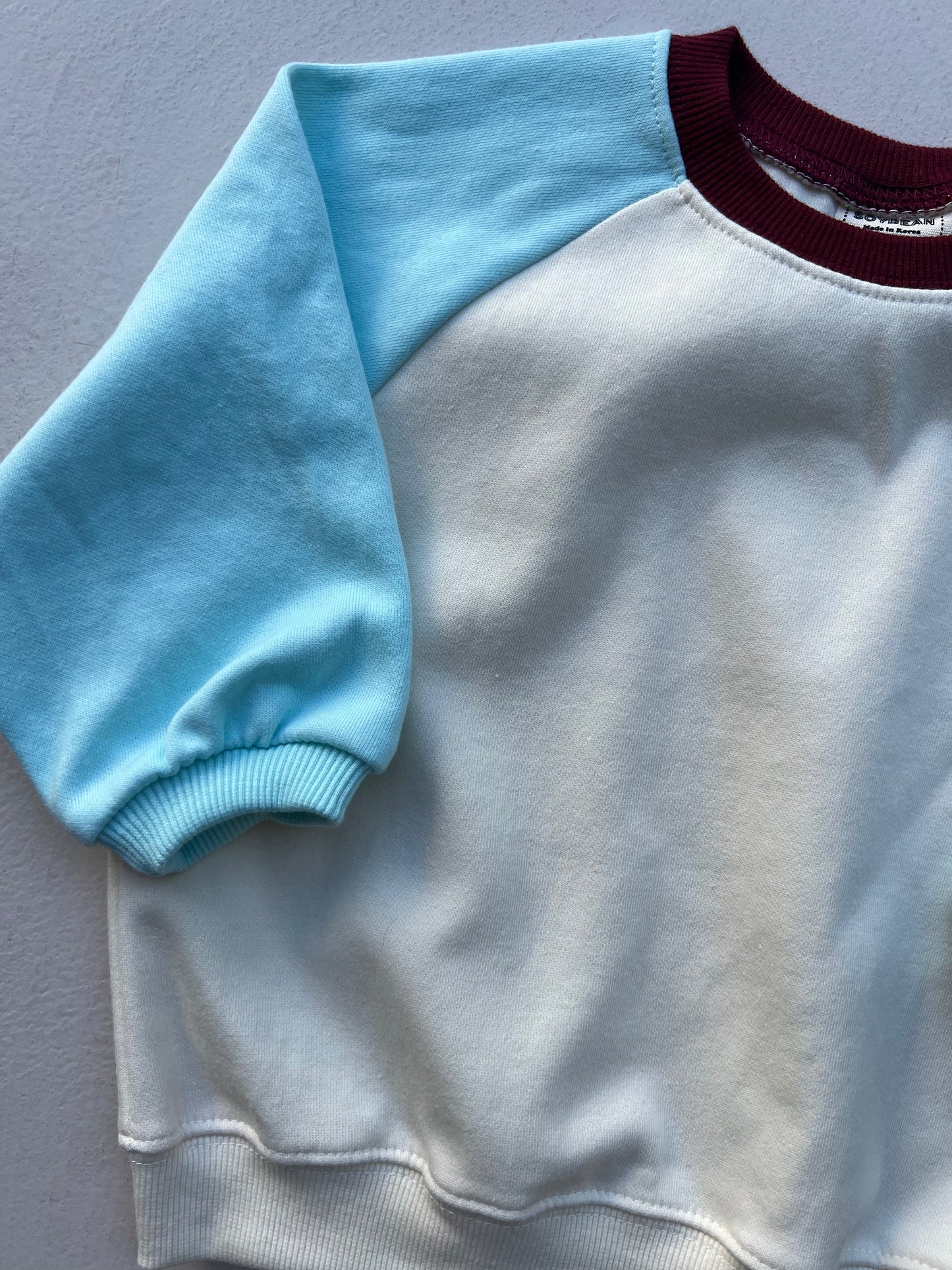 BLUE RAGLAN SWEATSHIRT