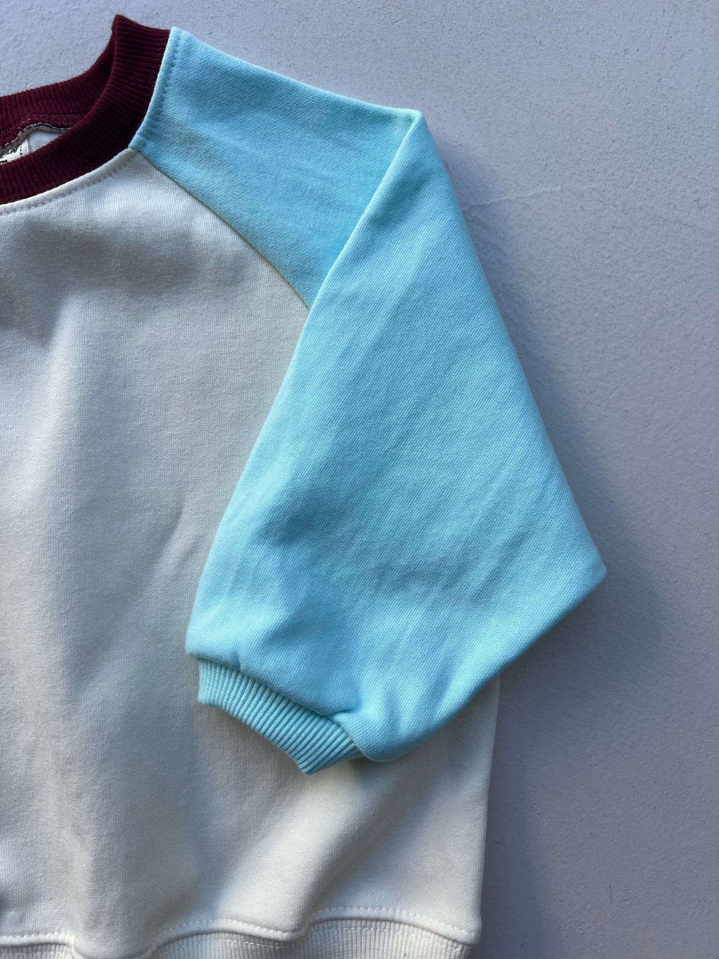 BLUE RAGLAN SWEATSHIRT